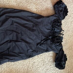 Black off shoulder ruffle top dress